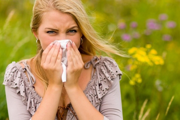 Woman with pollen allergies suffering from a Hay Fever
