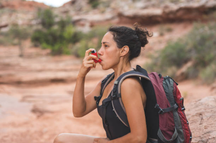 Woman with Chronic Asthma Hiking in Desert